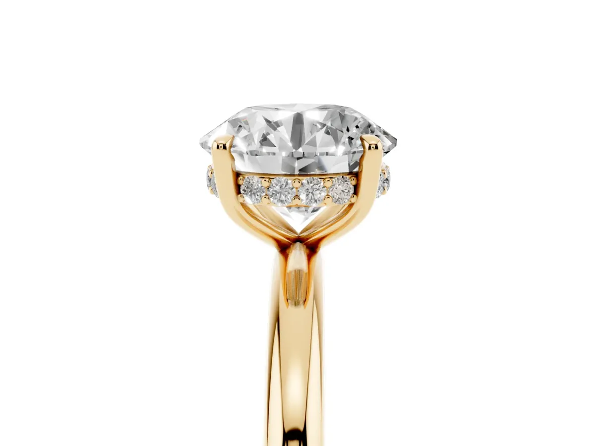Round Cut Diamond Solitaire Ring with Thin Band and Four-Prong Setting Yellow gold