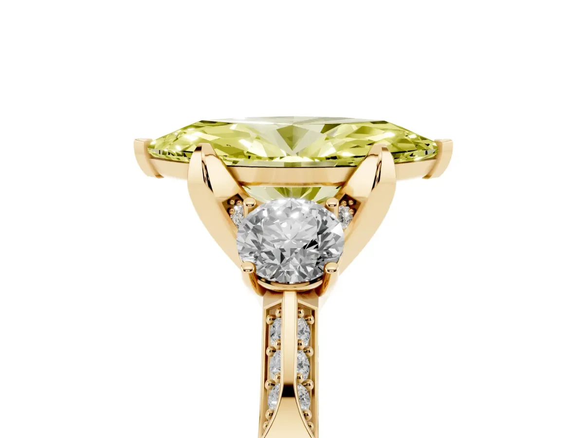 Fancy Yellow Marquise Cut Brilliant Three-Stone Diamond Ring with Pavé Band and Four-Prong Setting Yellow gold