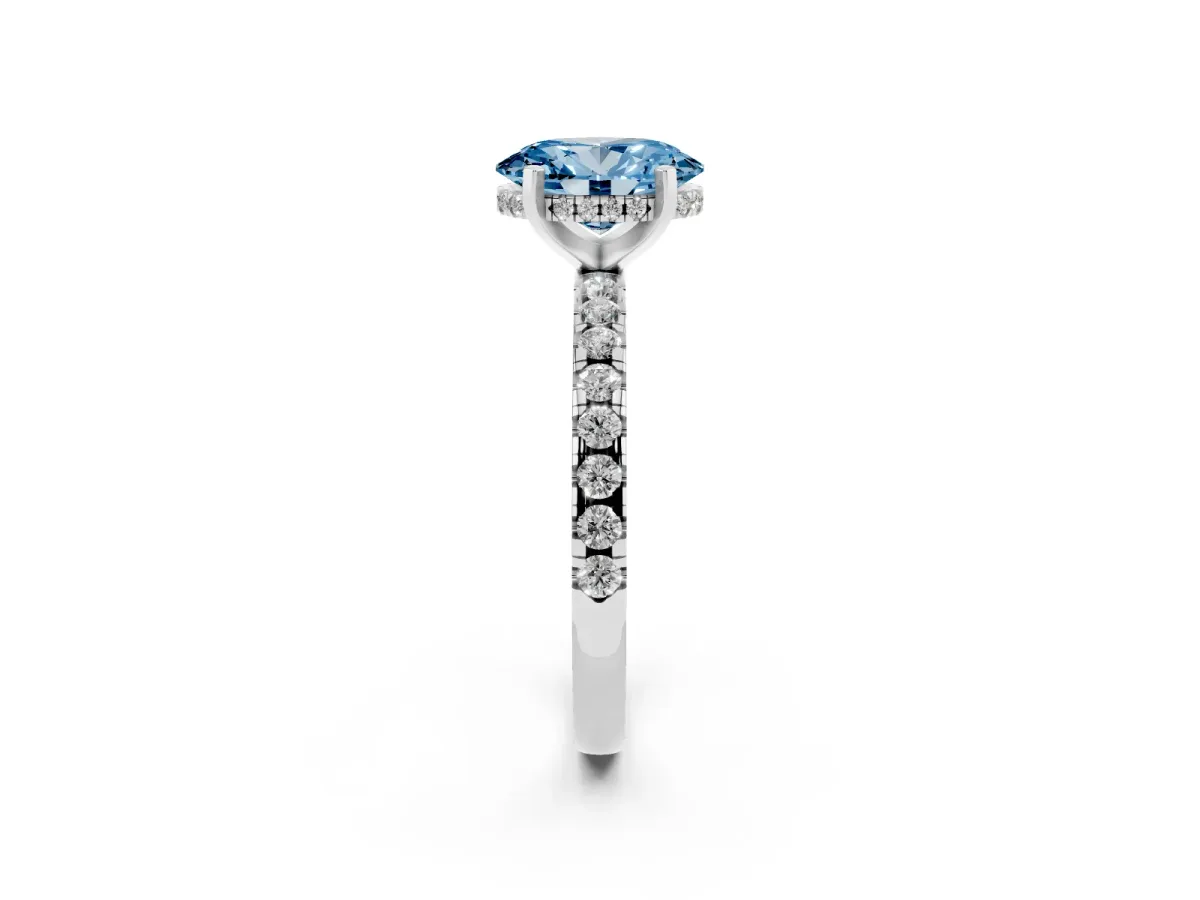 Fancy Blue Oval Cut Diamond Solitaire Ring with Round Pavé Band and Four-Prong Setting Silver