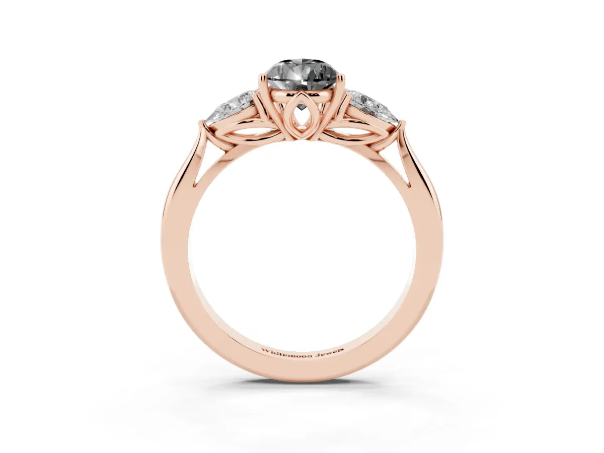 Fancy Black Three-Stone Pear Cut Brilliant Diamond Solitaire Ring with Tapered Band and Four-Prong Setting Rose gold