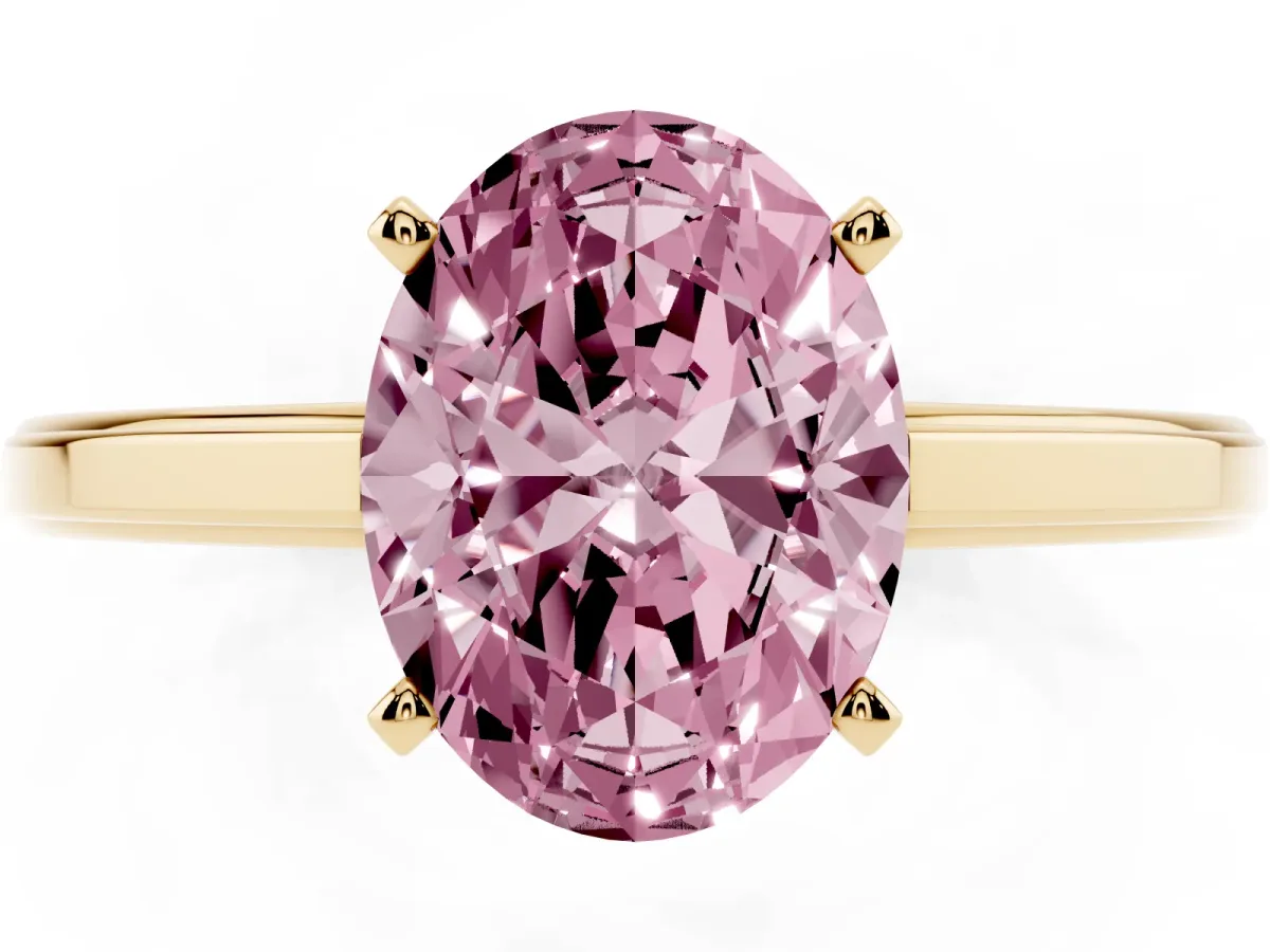 Fancy Pink Oval Cut Solitaire Diamond Ring with Four-Prong Setting and Classic Band Yellow gold
