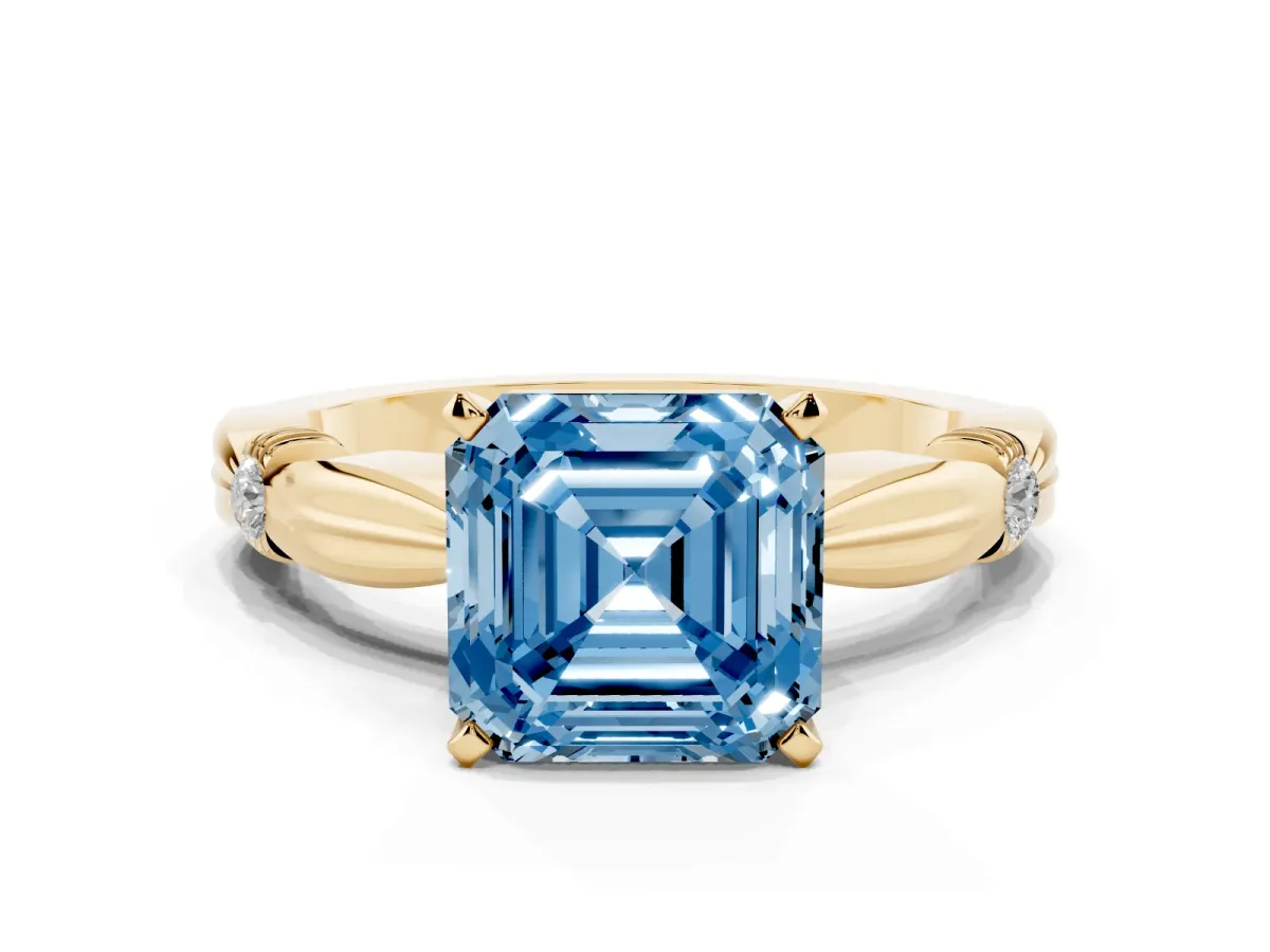 Fancy Blue Asscher Cut Solitaire Diamond Twisted Band with Four-Prong Setting Yellow gold