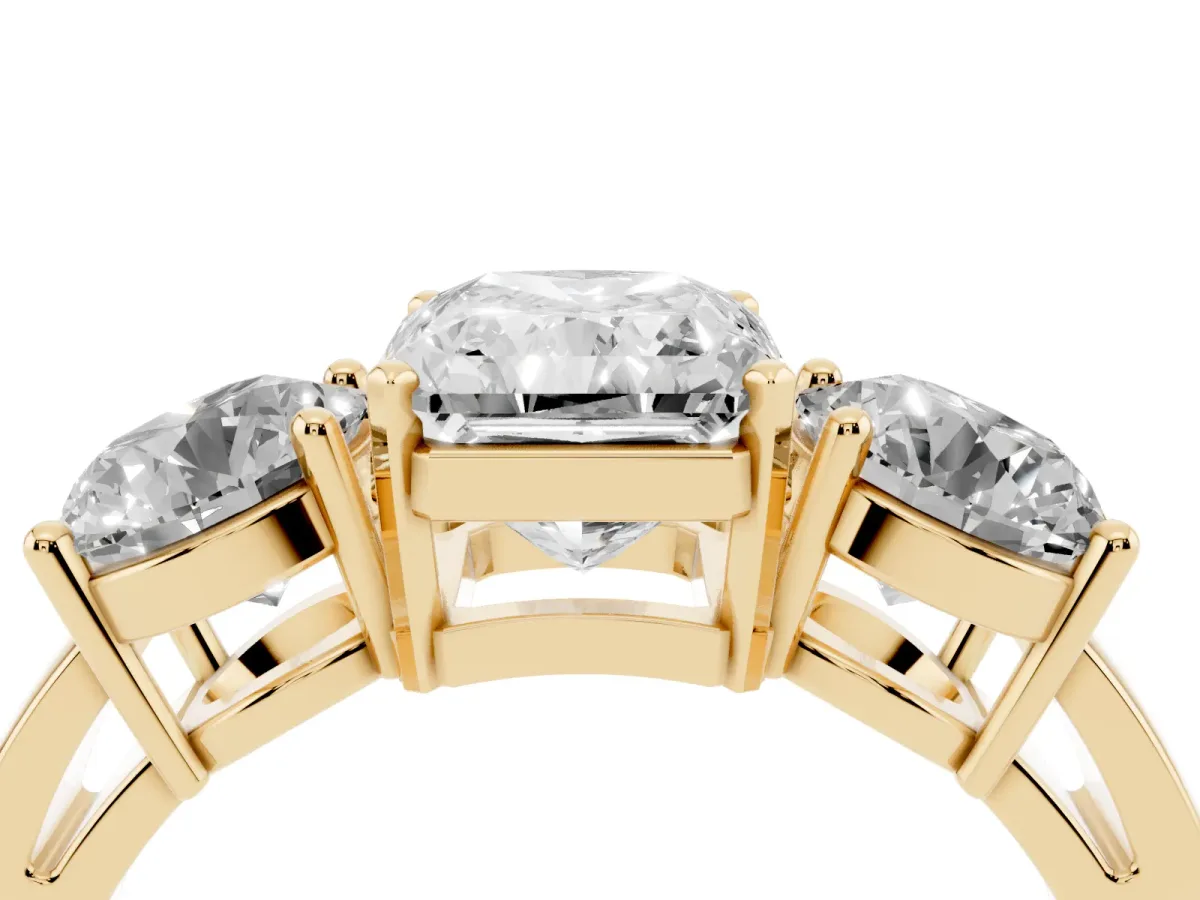 Three-Stone Radiant Cut Diamond Ring with Round Side Stones, Classic Band, and Four-Prong Setting Yellow gold