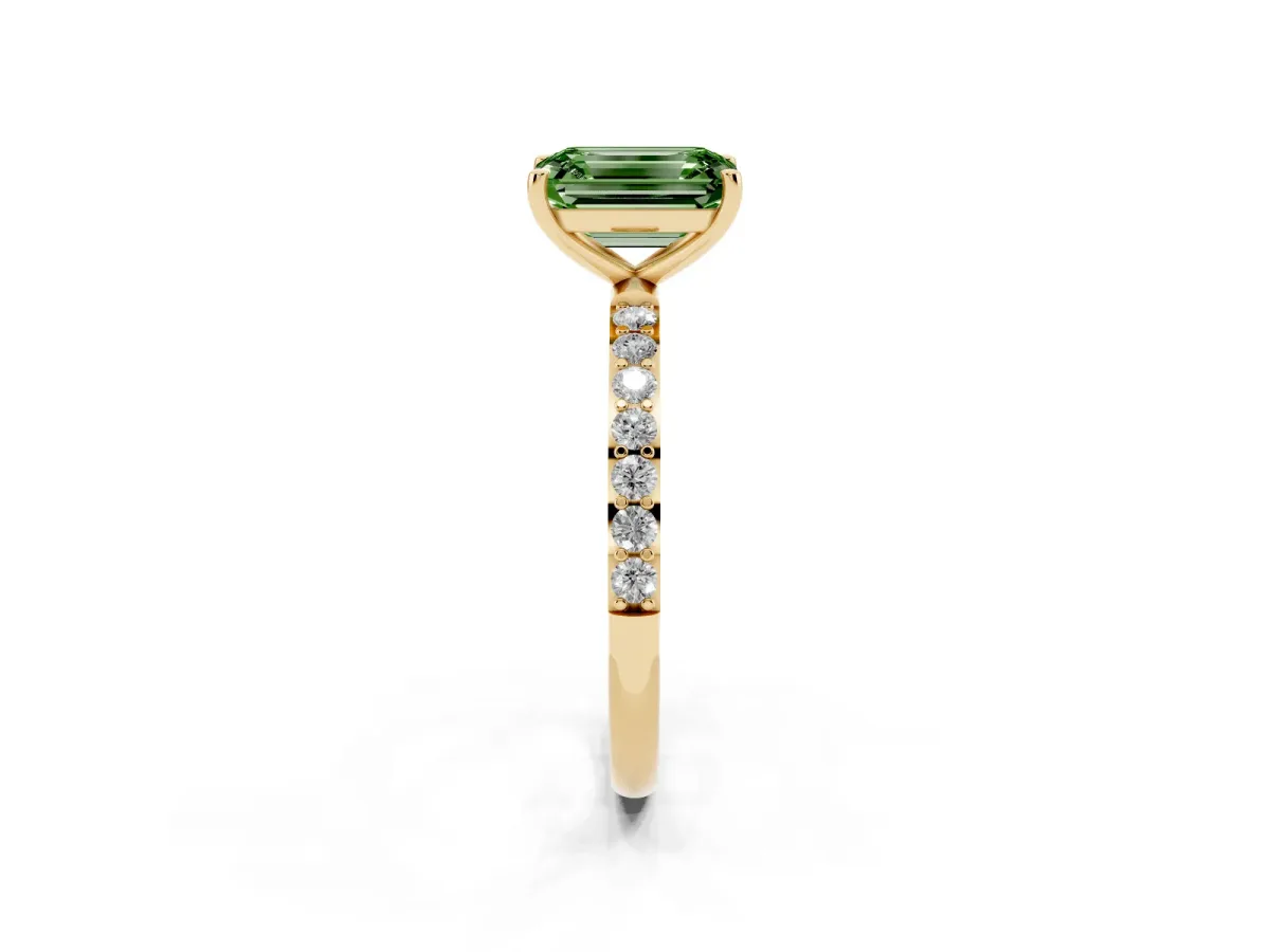 Fancy Green Emerald Cut Diamond Solitaire Ring with Round Pavé Shoulders and Prong Setting Yellow gold