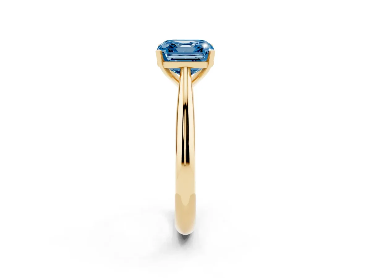 Fancy Blue Asscher Cut Diamond Solitaire Engagement Ring with Cathedral Setting and Four-Prong Mount Yellow gold