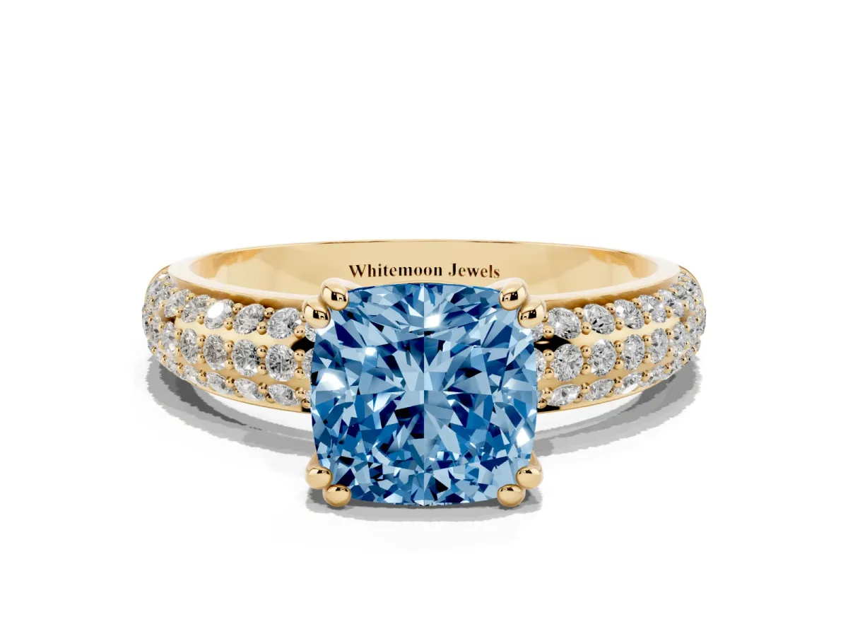 Fancy Blue Cushion Cut Diamond Solitaire Ring with Multi-Row Round Pavé Band and Prong Setting Yellow gold