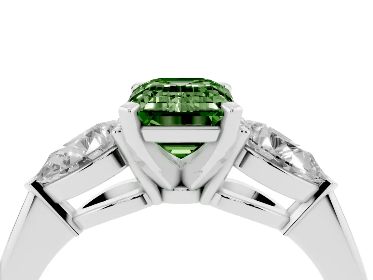 Fancy Green Three-Stone Emerald Cut Diamond Ring with Pear Side Stones and Four-Prong Setting Silver