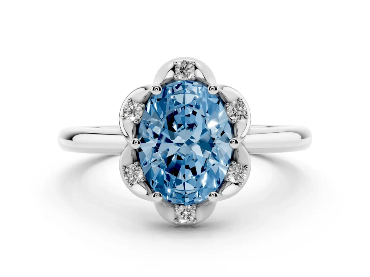 Fancy Blue Oval Cut Halo Diamond Ring with Round Cluster Setting, Solitaire Band, and Four-Prong Setting Silver