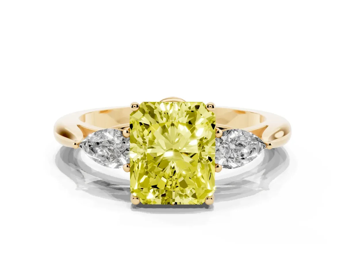 Fancy Yellow Three-Stone Radiant Cut Diamond Ring with Pear Side Stones in Four-Prong Setting Yellow gold