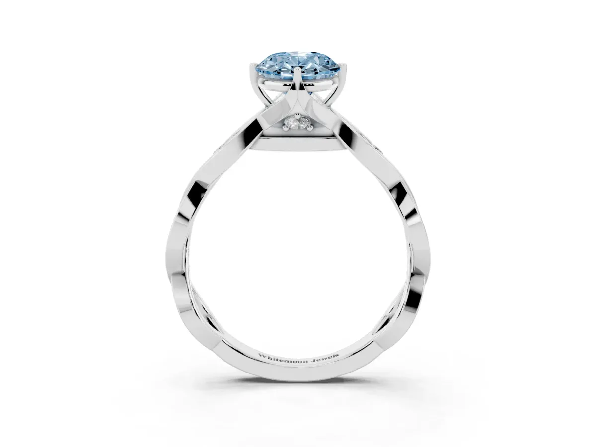 Fancy Blue Oval Cut Solitaire Twist Band with Leaf Prong Setting Silver