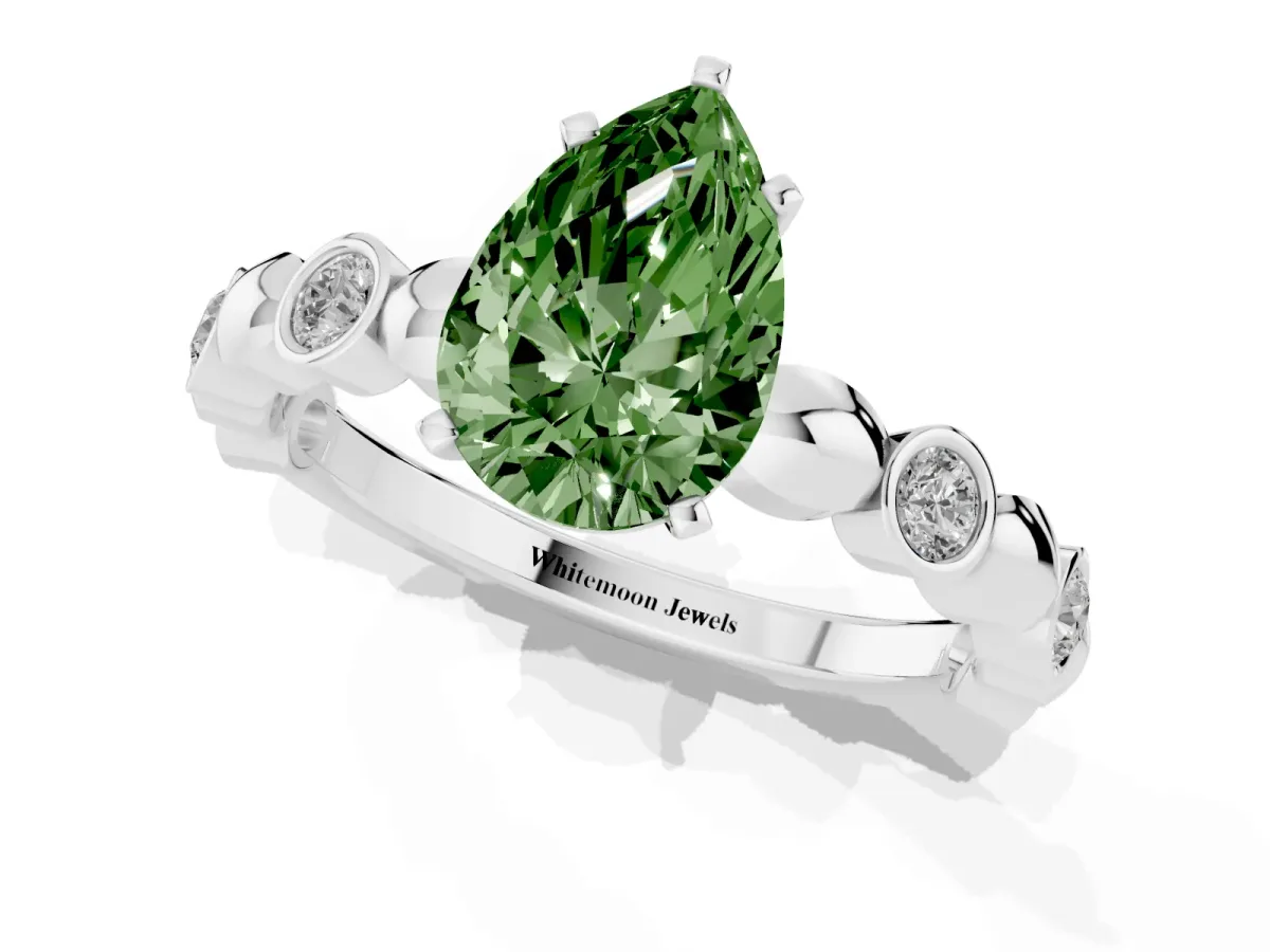 Fancy Green Pear Cut Solitaire Bezel-Set Diamond Ring with Beaded Band and Four-Prong Setting Silver