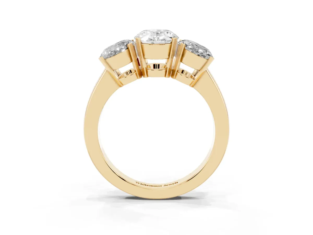 Three-Stone Oval Cut Cut Diamond Ring with Channel Set Band and Four-Prong Setting Yellow gold