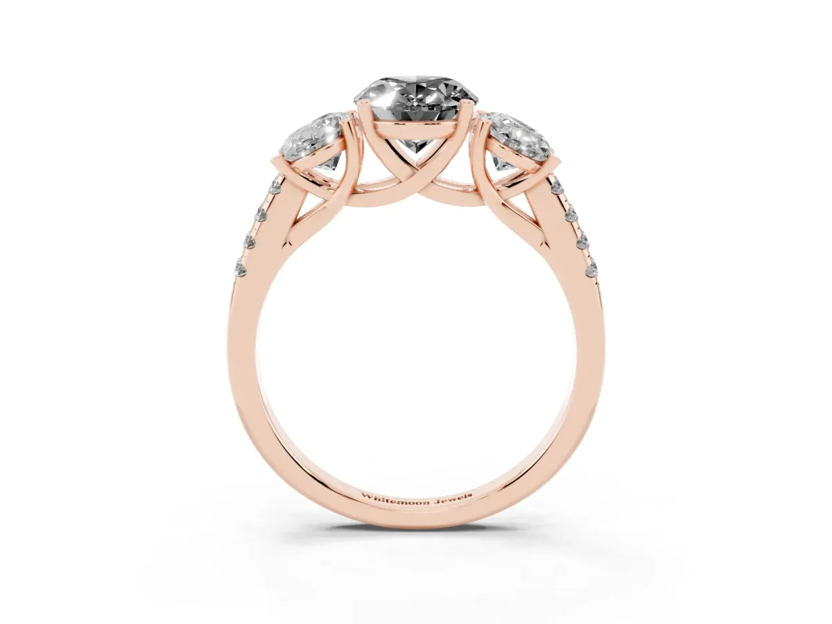 Fancy Black Three-Stone Oval Cut Diamond Ring with Round Pavé Band and Prong Setting Rose gold