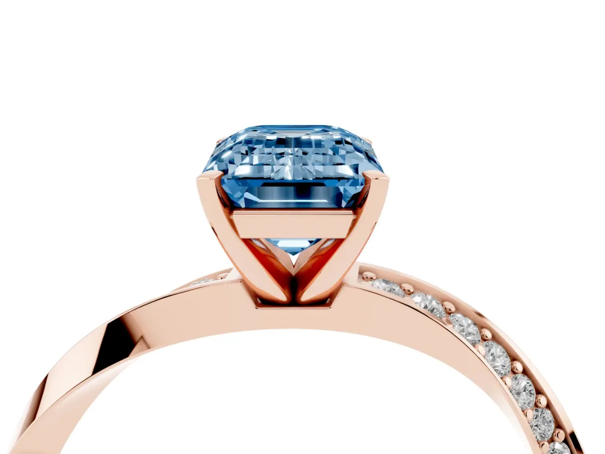 Fancy Blue Emerald Cut Diamond Engagement Ring with Side Stone Accents and Four-Prong Setting Rose gold