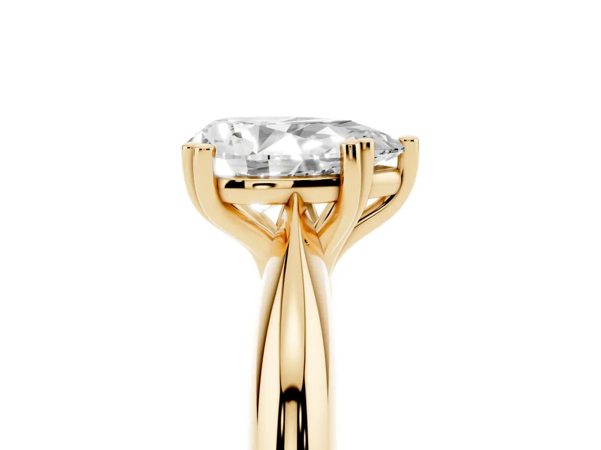 Pear Cut Cut Solitaire Engagement Ring with Tapered Band and Four-Prong Setting Yellow gold