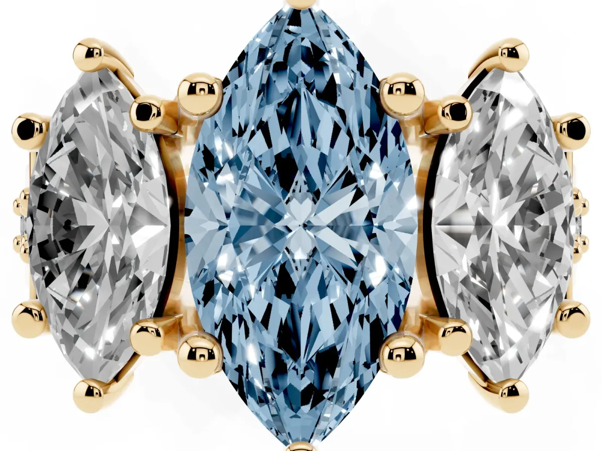 Fancy Blue Marquise Cut Diamond Three-Stone Ring with Channel Set Band and Four-Prong Setting Yellow gold