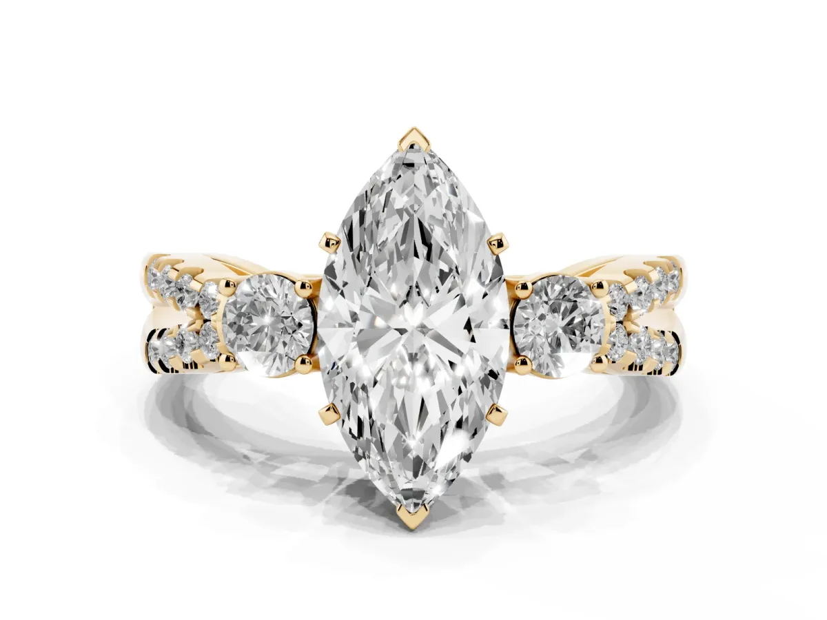 Marquise Cut Diamond Three-Stone Ring with Pavé Split Shank and Four-Prong Setting Yellow gold