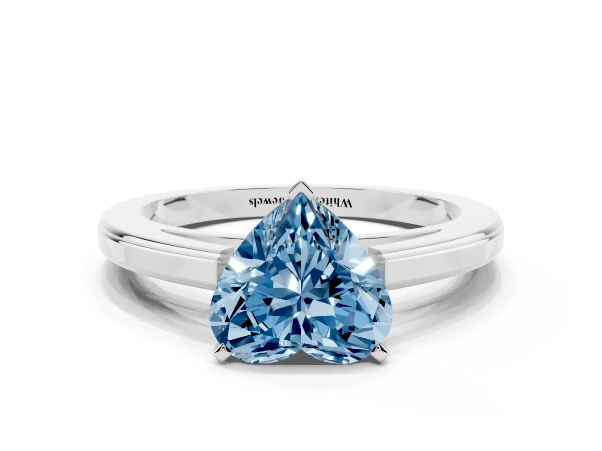 Fancy Blue Heart Cut Solitaire Diamond Ring with Four-Prong Setting and Classic Band Platinum