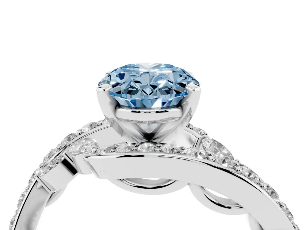 Fancy Blue Oval Cut Solitaire with Pavé Twist Band and Four-Prong Setting Silver
