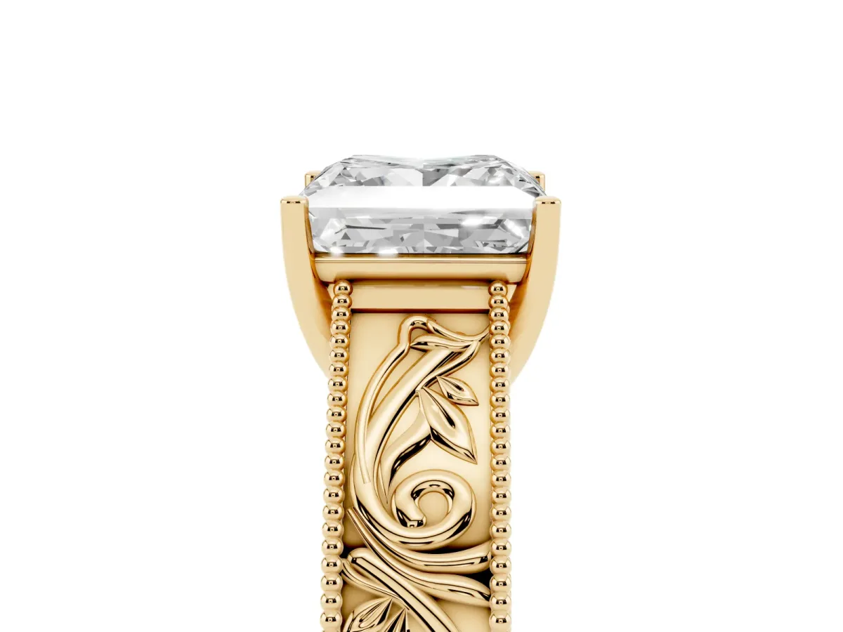 Princess Cut Diamond Solitaire Ring with Engraved Band and Four-Prong Setting Yellow gold