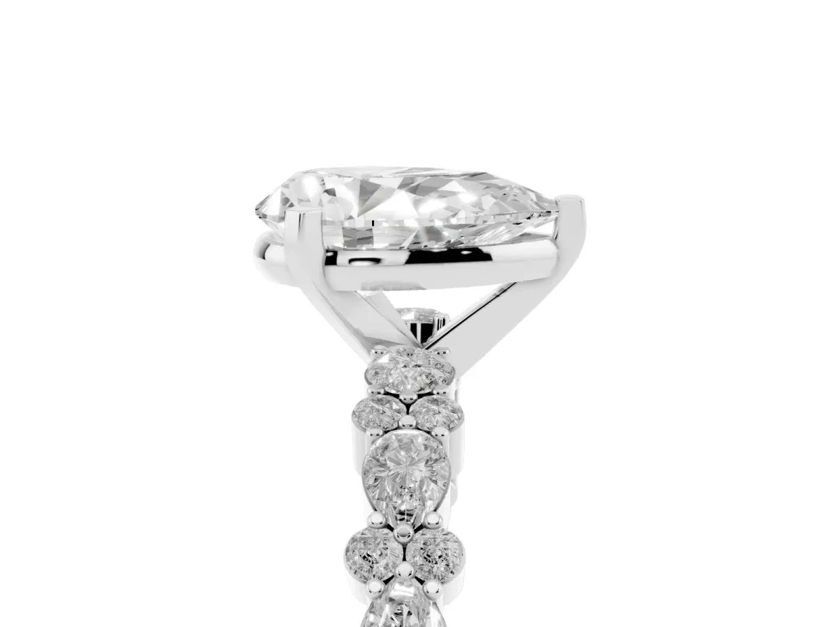 Pear Cut Diamond Side Stone Solitaire Ring with Round and Four-Prong Setting Silver