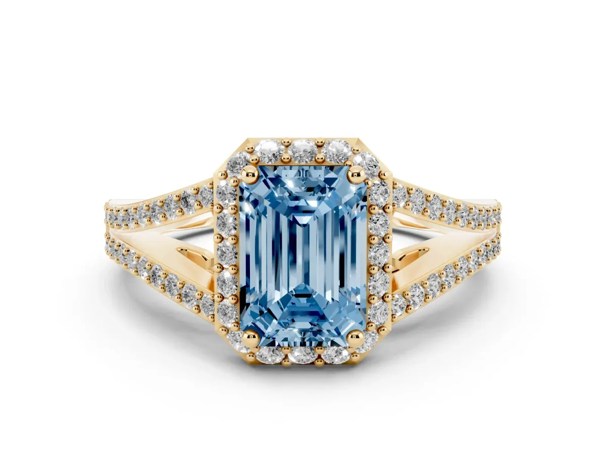 Fancy Blue Emerald Cut Halo Split Shank Pave Diamond Ring with Four-Prong Setting Yellow gold
