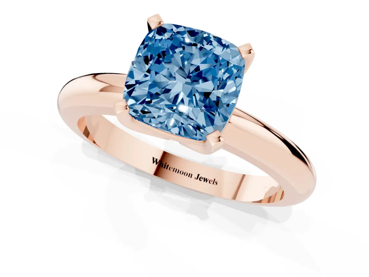 Fancy Blue Cushion Cut Diamond Solitaire Engagement Ring with Round Band and Four-Prong Setting Rose gold