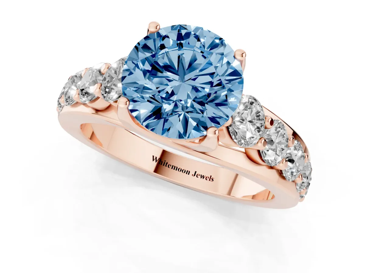 Fancy Blue Round Cut Diamond Engagement Ring with Pavé Band and Four-Prong Setting Rose gold