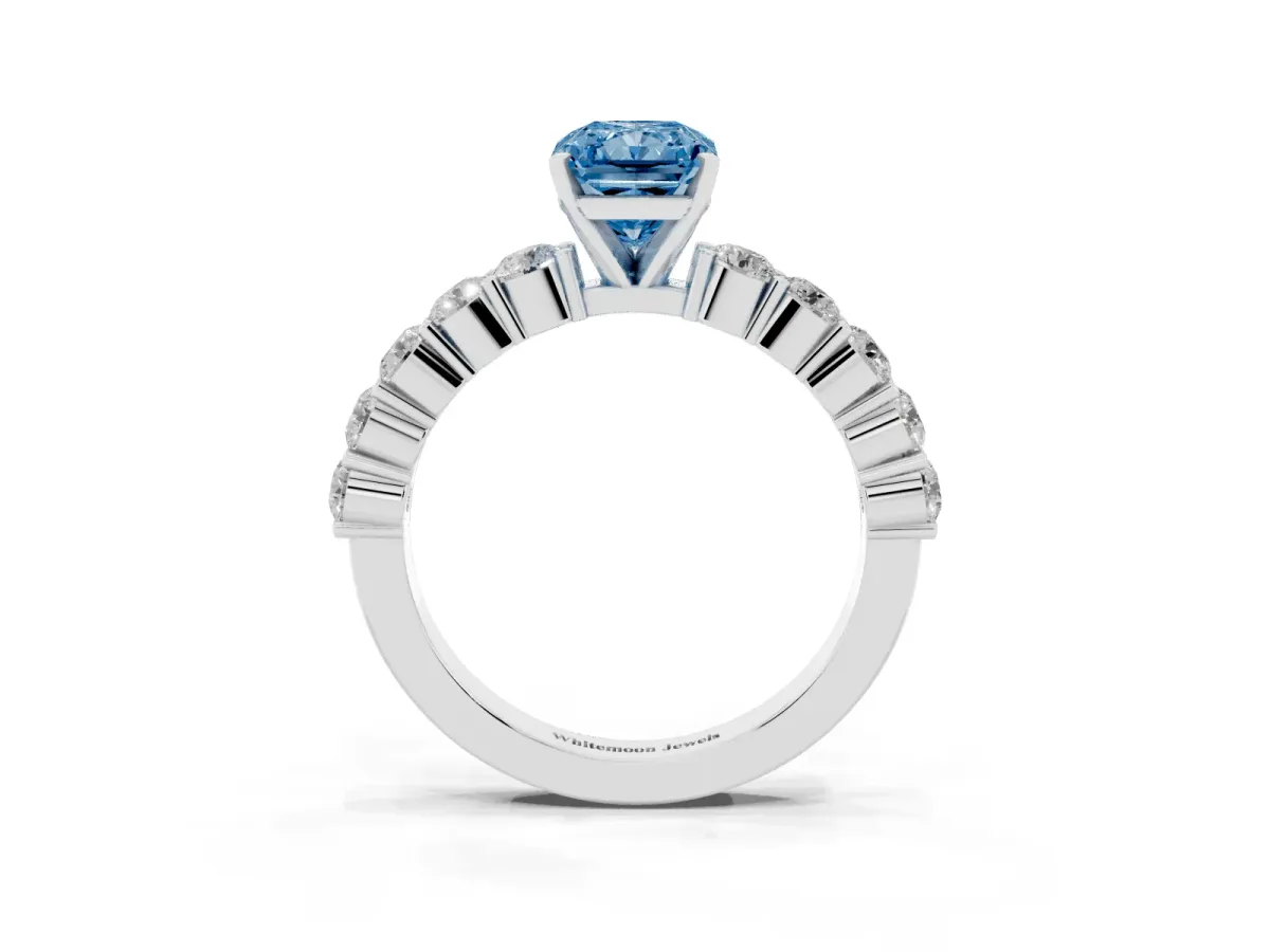 Fancy Blue Radiant Cut Diamond Solitaire Ring with Shared Prong Round Side Stones Platinum