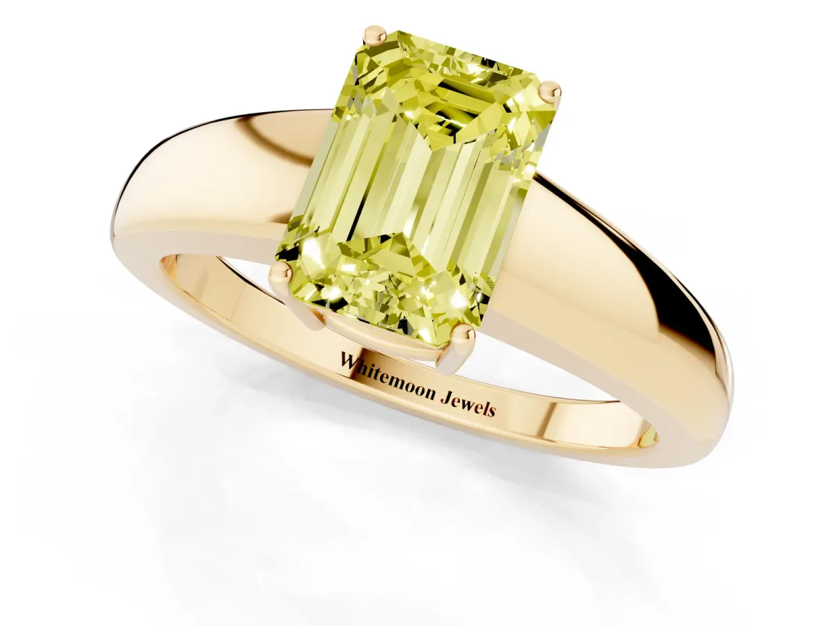 Fancy Yellow Emerald Cut Solitaire Diamond Ring with Tapered Band and Four-Prong Setting Yellow gold