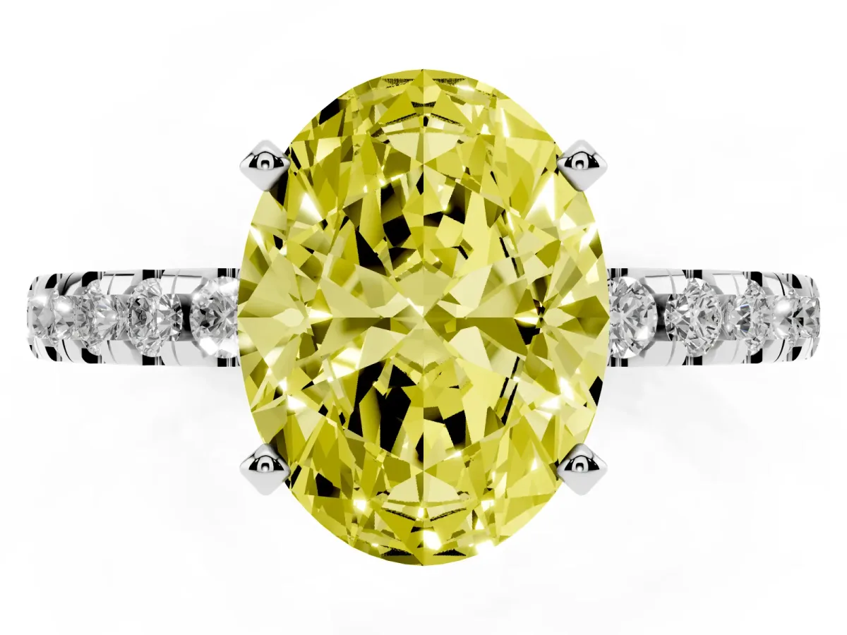 Fancy Yellow Oval Cut Diamond Solitaire Ring with Round Pavé Band and Four-Prong Setting Silver
