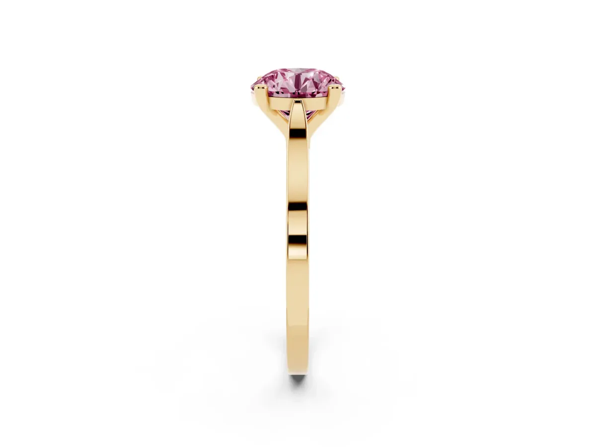 Fancy Pink Round Cut Solitaire Diamond Ring with Four-Prong Setting and Tapered Band Yellow gold