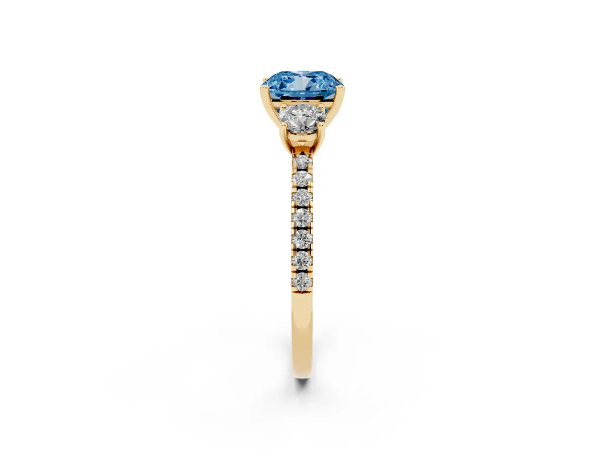Fancy Blue Three-Stone Cushion Cut Cut Diamond Pavé Band with Prong Setting Yellow gold