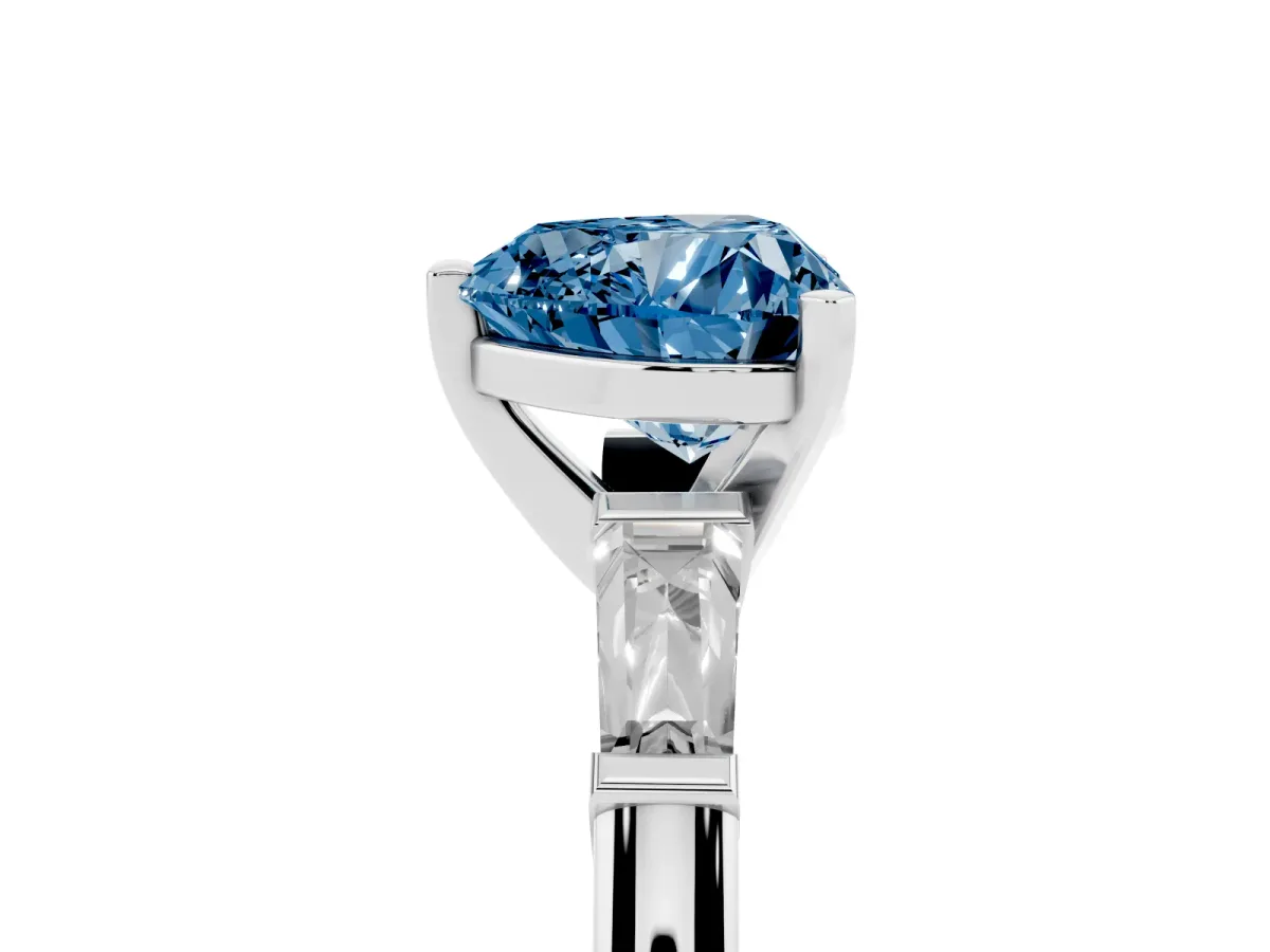 Fancy Blue Heart Cut Solitaire with Tapered Baguette Side Stones on a Classic Band with Four-Prong Setting White gold