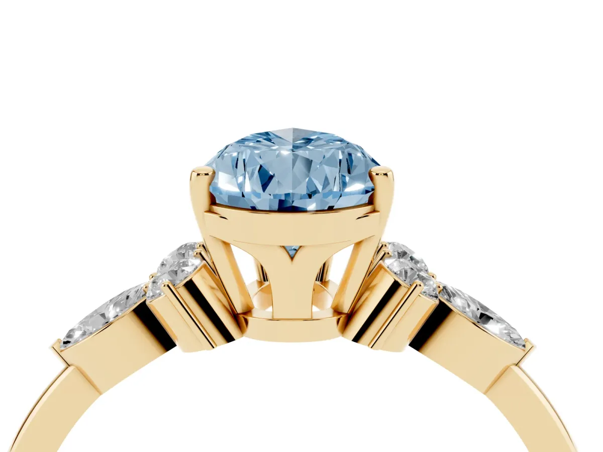 Fancy Blue Pear Cut Brilliant Diamond Solitaire Ring with Pear Side Stones and Four-Prong Setting Yellow gold