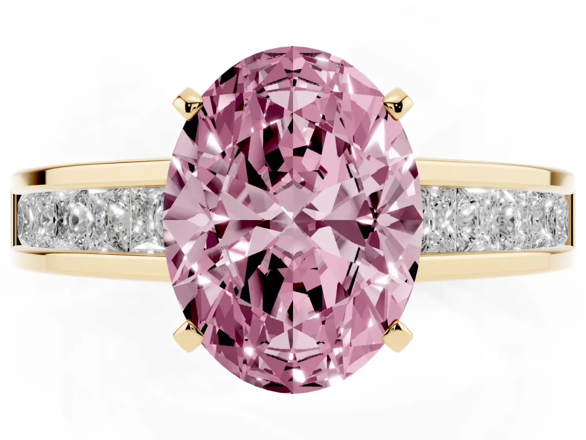 Fancy Pink Oval Cut Solitaire Diamond Ring with Channel-Set Band and Four-Prong Setting Yellow gold