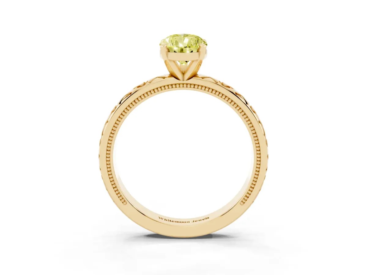 Fancy Yellow Pear Cut Solitaire Diamond Engagement Ring with XO Engraved Band and Four-Prong Setting Yellow gold
