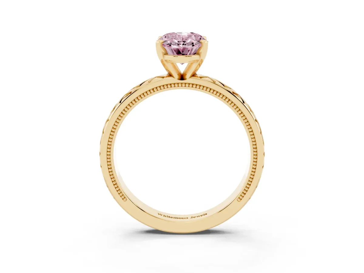 Fancy Pink Oval Cut Solitaire Diamond Ring with Milgrain and Black Enamel X Pattern Band Yellow gold