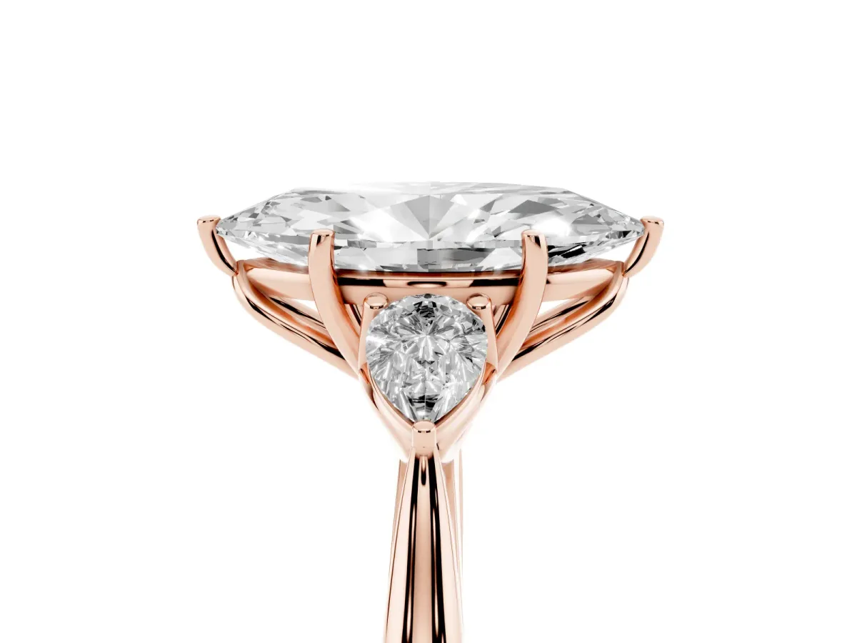 Marquise Cut Diamond Three-Stone Ring with Pear Side Stones and Prong Setting Rose gold