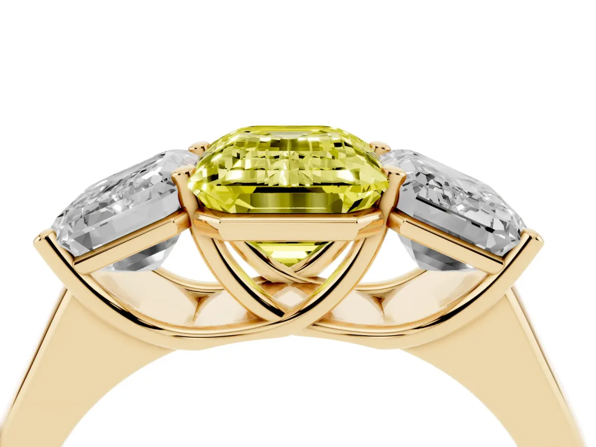 Fancy Yellow Emerald Cut Three-Stone Diamond Ring with Prong Setting on a Classic Band Yellow gold