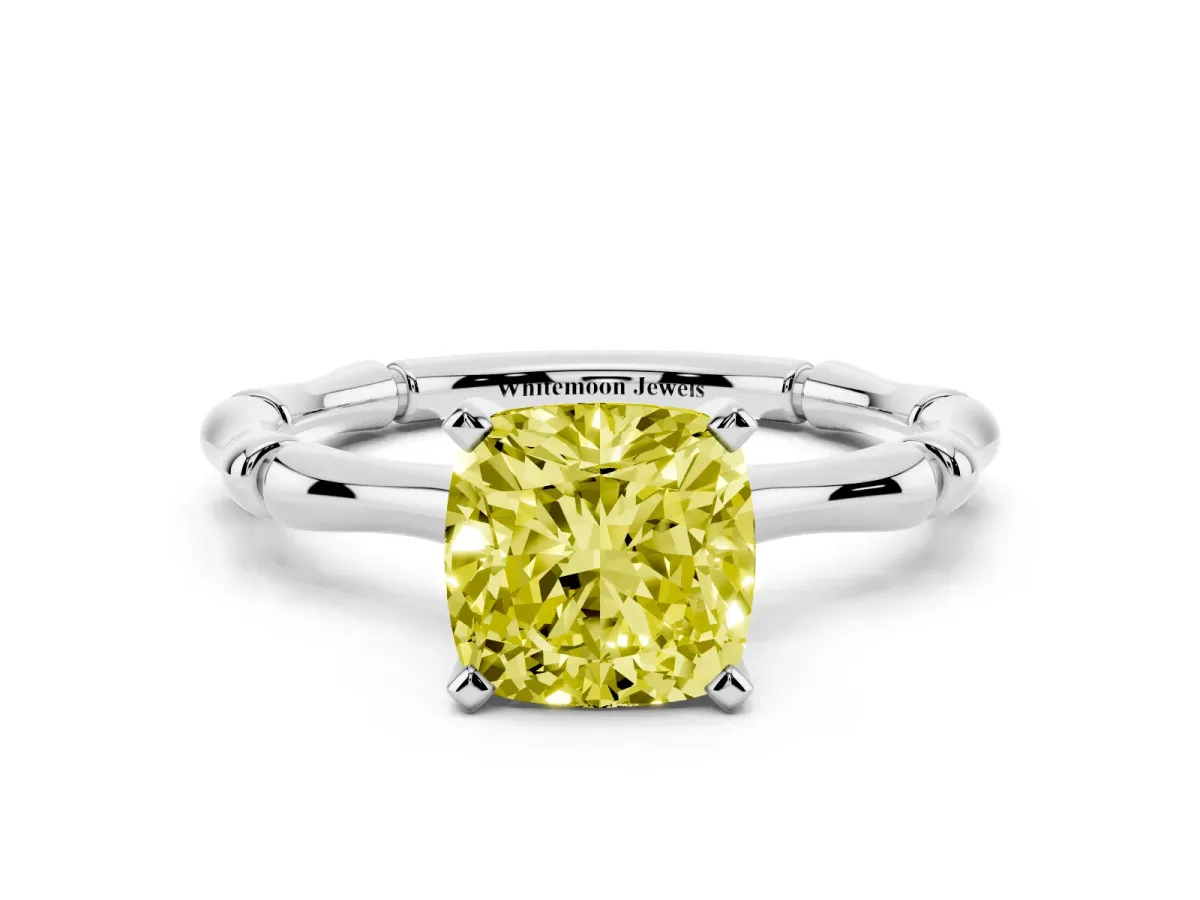 Fancy Yellow Cushion Cut Solitaire Diamond Ring with Bamboo Band and Four-Prong Setting Platinum