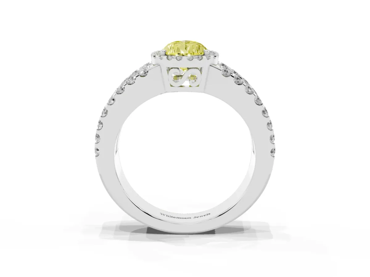 Fancy Yellow Pear Cut Cut Halo Split Shank Diamond Ring with Four-Prong Setting Platinum
