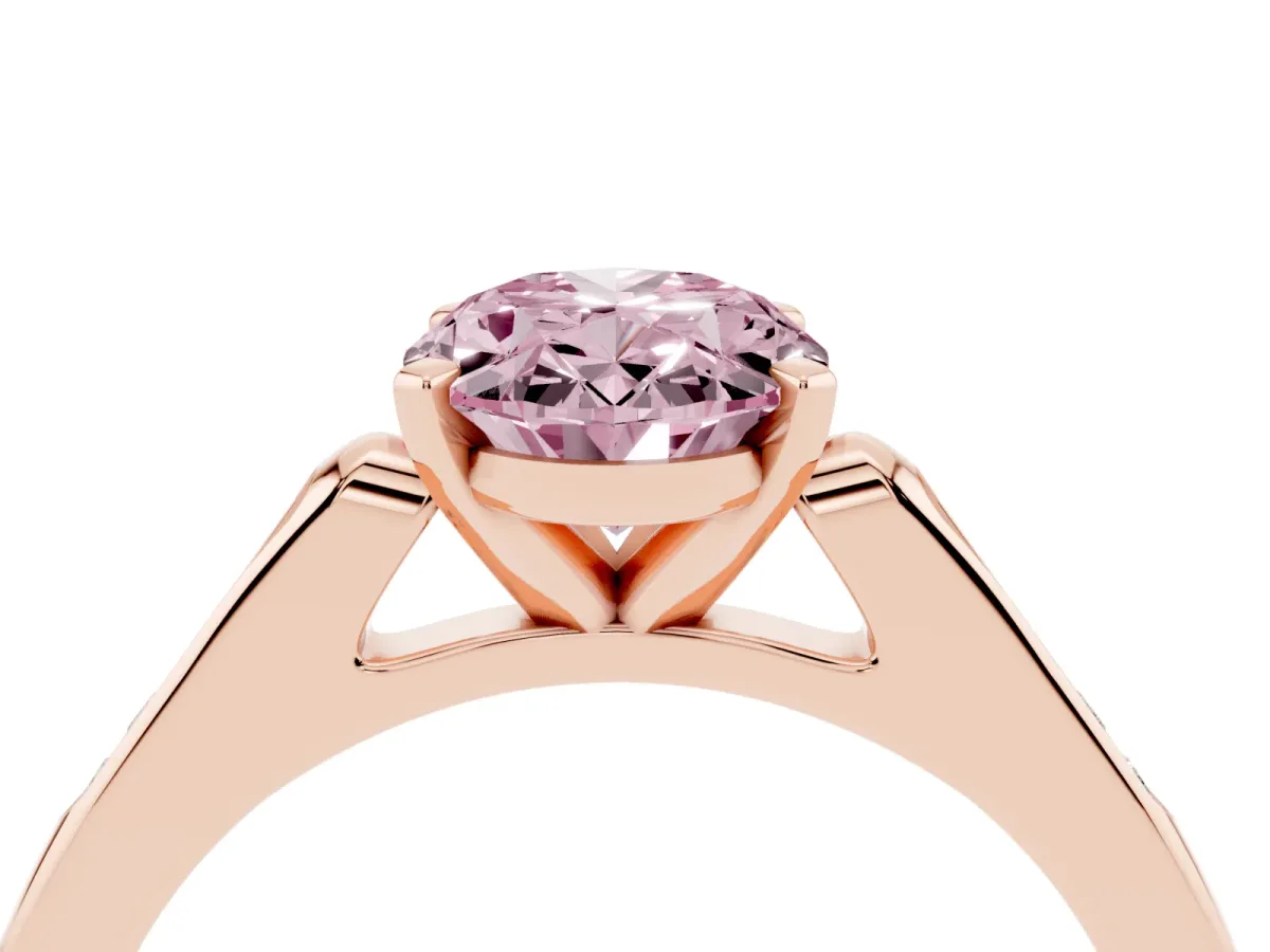 Fancy Pink Oval Cut Diamond Solitaire Ring with Channel Set Round Band and Prong Setting Rose gold