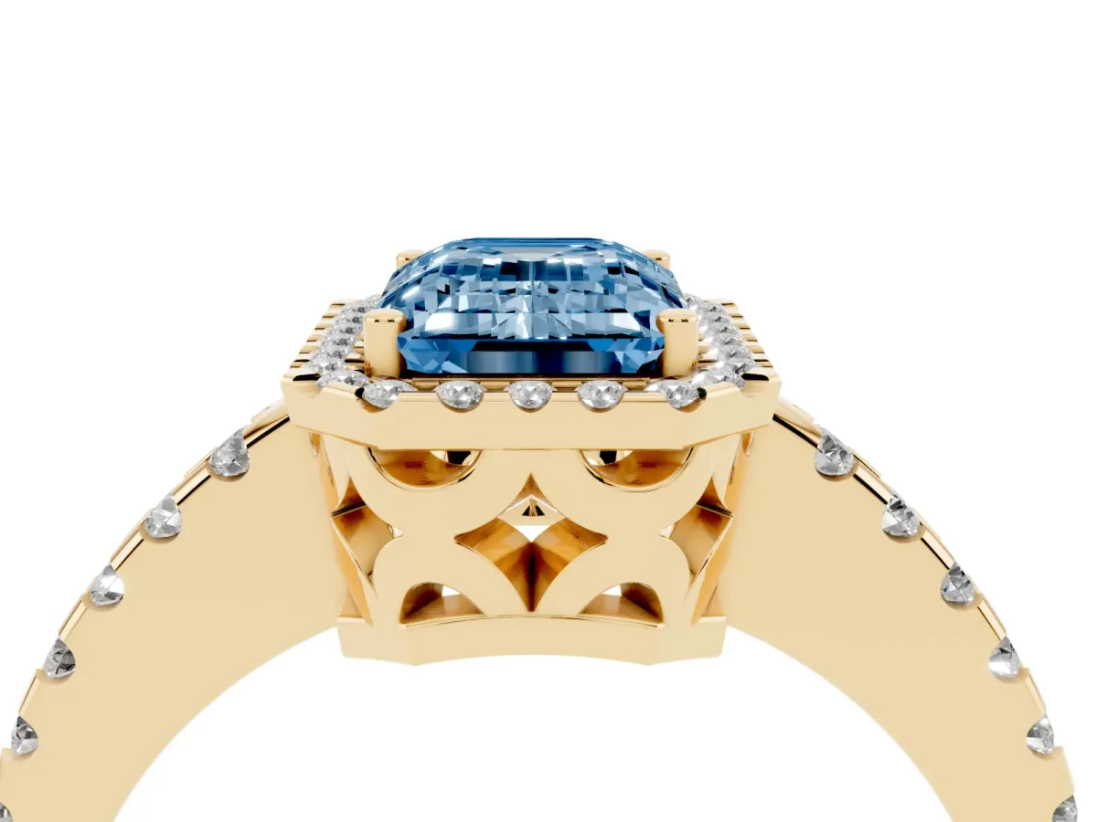 Fancy Blue Emerald Cut Diamond Halo Engagement Ring with Pavé Band and Prong Setting Yellow gold