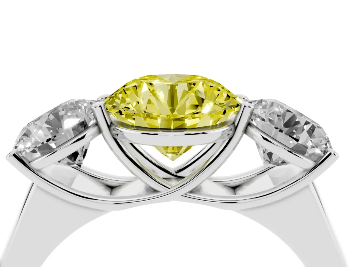 Fancy Yellow Round Cut Three-Stone Diamond Ring with Prong Setting on a Classic Band Silver
