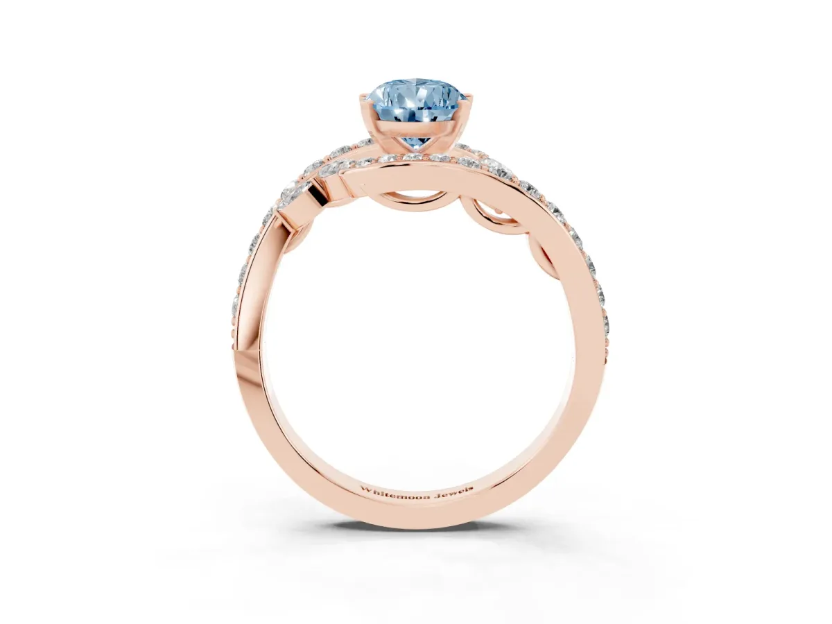 Fancy Blue Pear Cut Solitaire with Pavé Twist Band and Four-Prong Setting Rose gold
