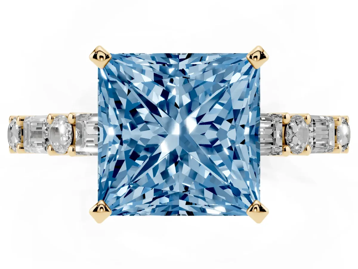 Fancy Blue Princess Cut Diamond Solitaire with Side Baguettes and Channel Set Band Yellow gold