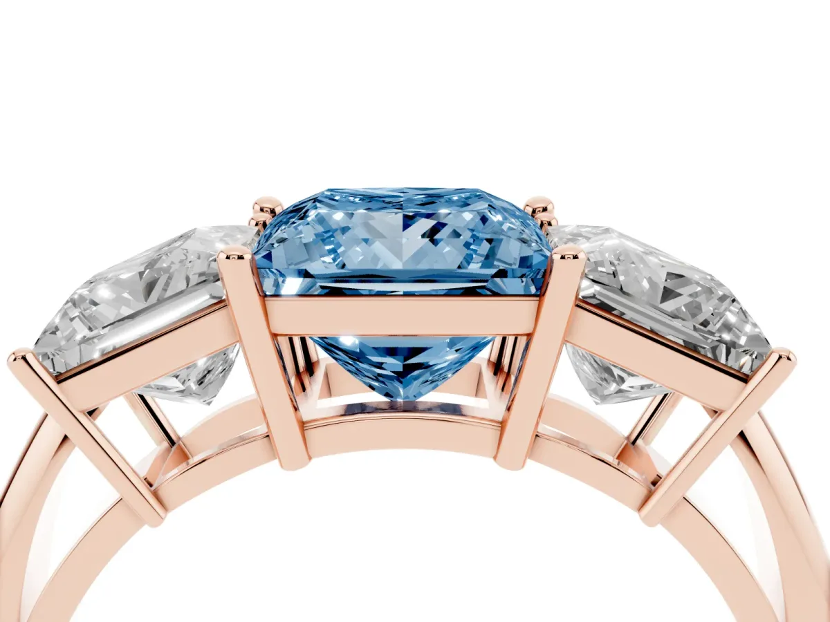 Fancy Blue Three-Stone Princess Cut Cut Diamond Engagement Ring with Prong Setting on a White Gold Band Rose gold