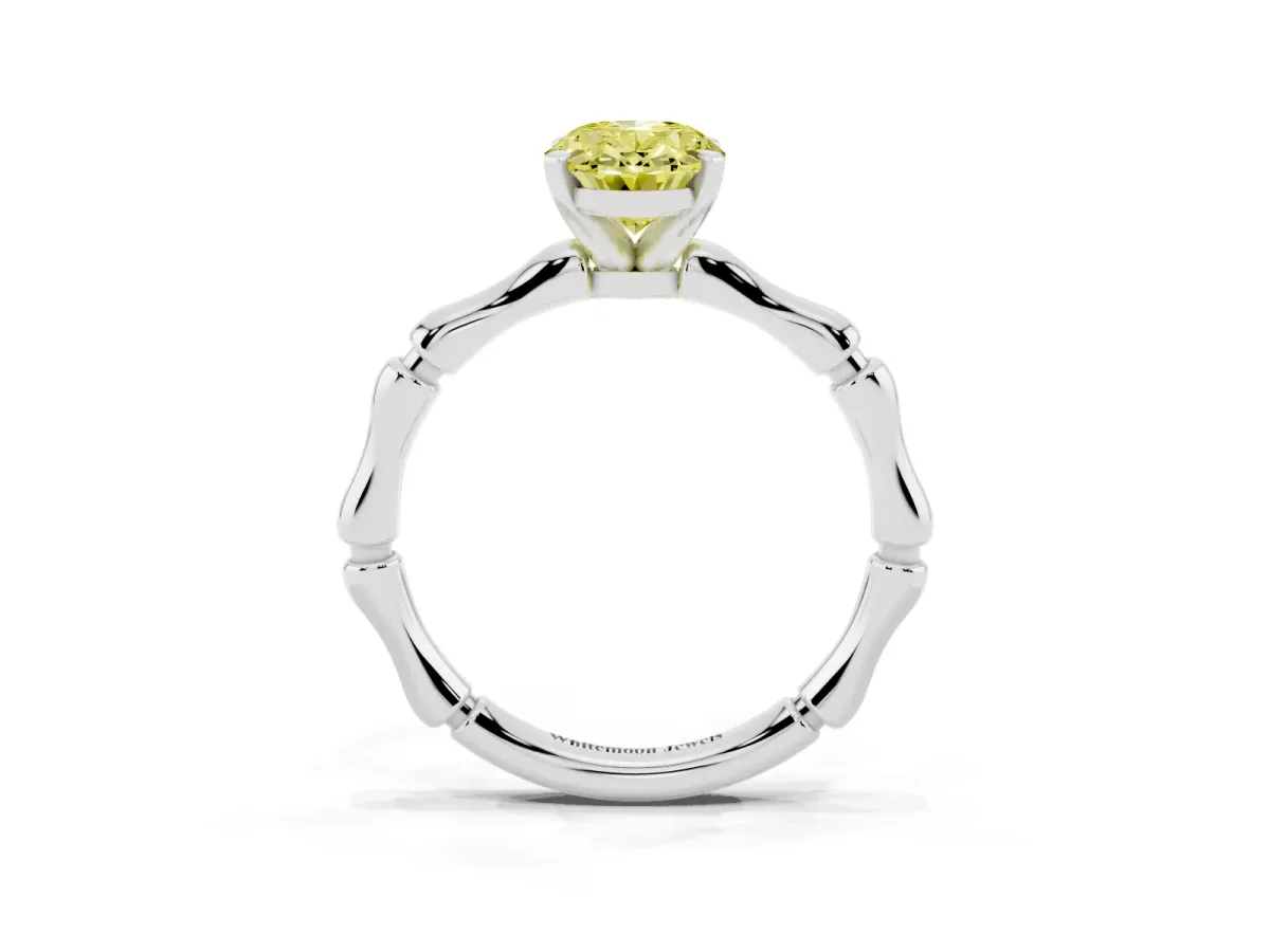 Fancy Yellow Oval Cut Solitaire Diamond Ring with Bamboo Band and Four-Prong Setting Silver
