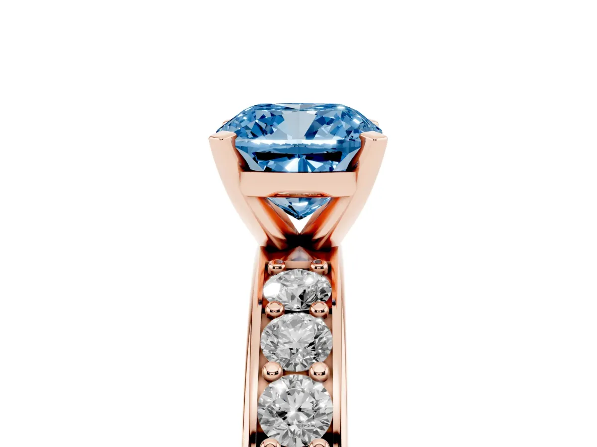 Fancy Blue Cushion Cut Diamond Engagement Ring with Channel Set Round Band and Prong Setting Rose gold